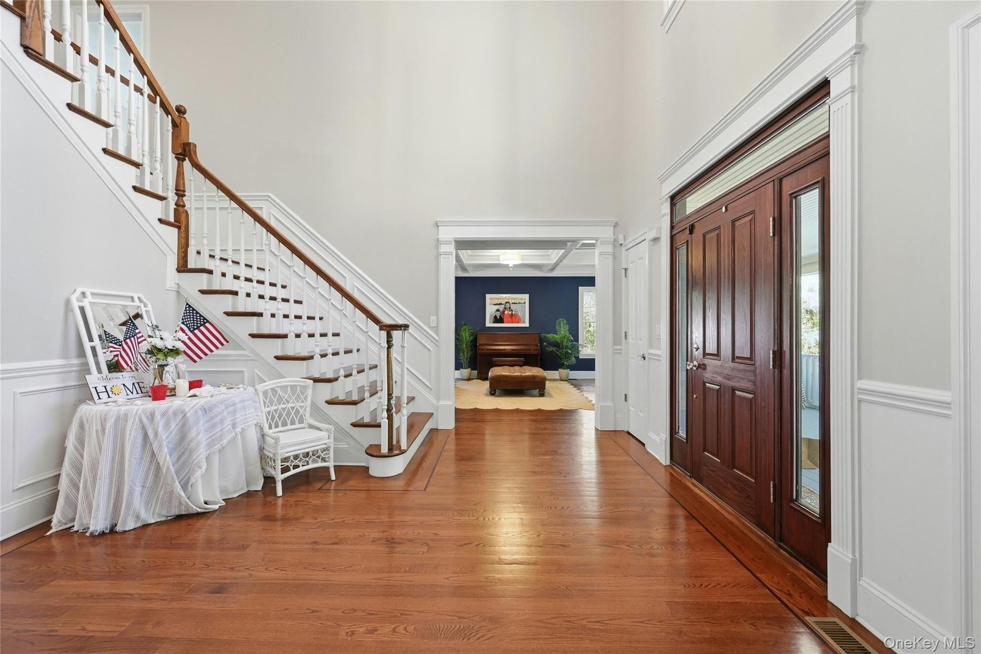 Large Foyer w Wood Floors Throughout