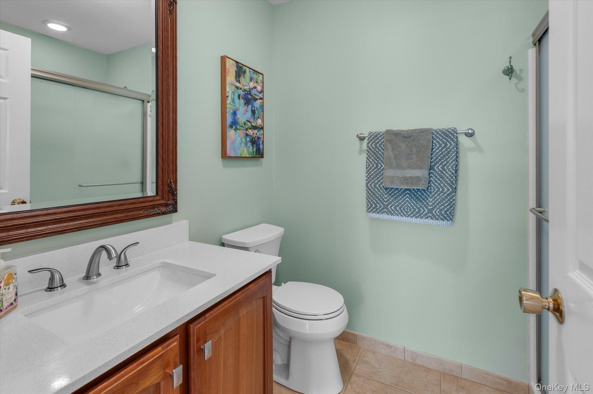 Hallway bathroom.  Walk in shower.