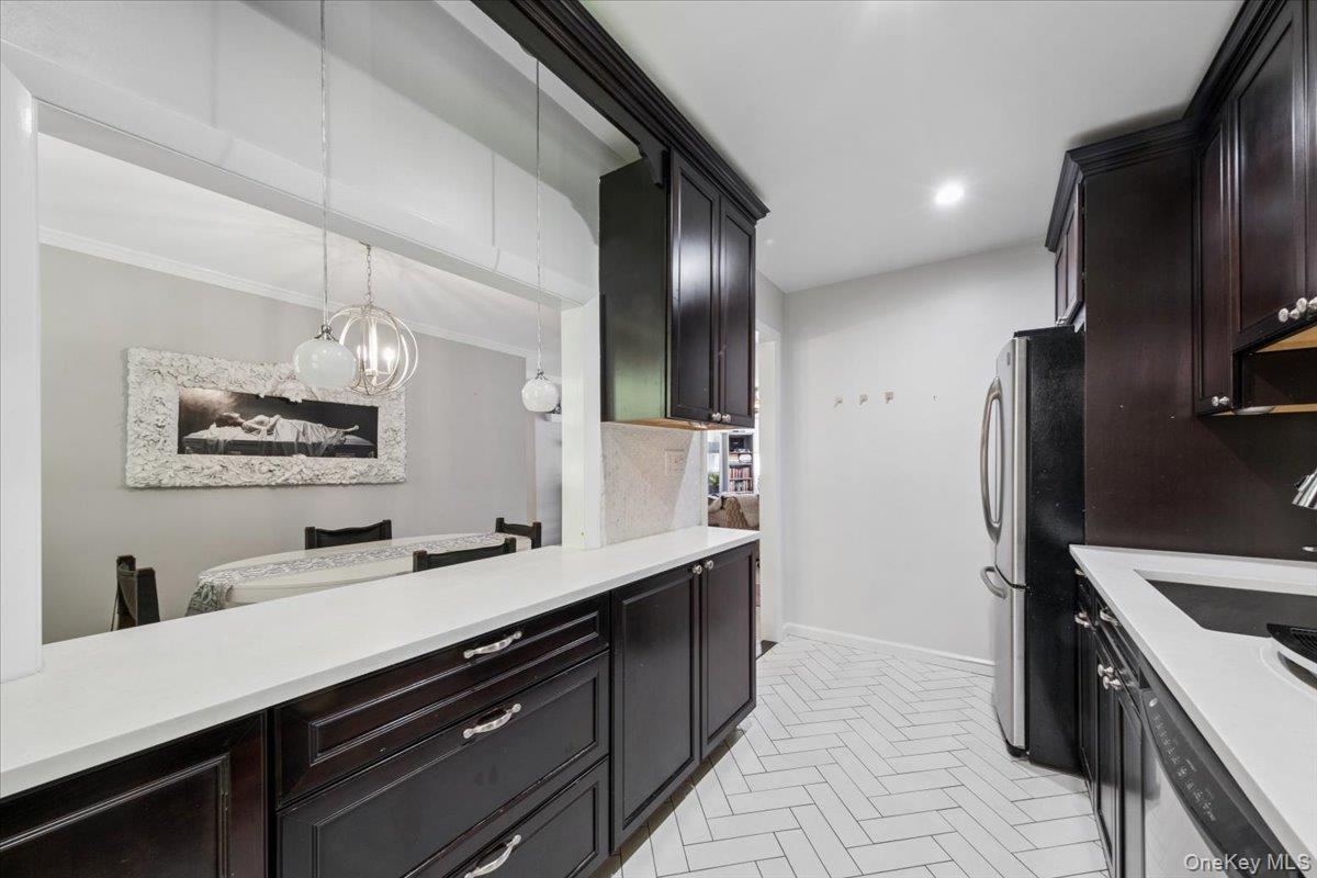 Kitchen pass-through for easy access to dining room and open floor plan