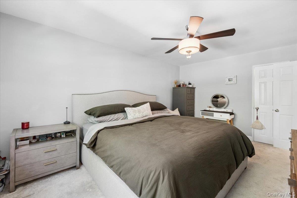Spacious Primary Bedroom has en suite bathroom and large closets