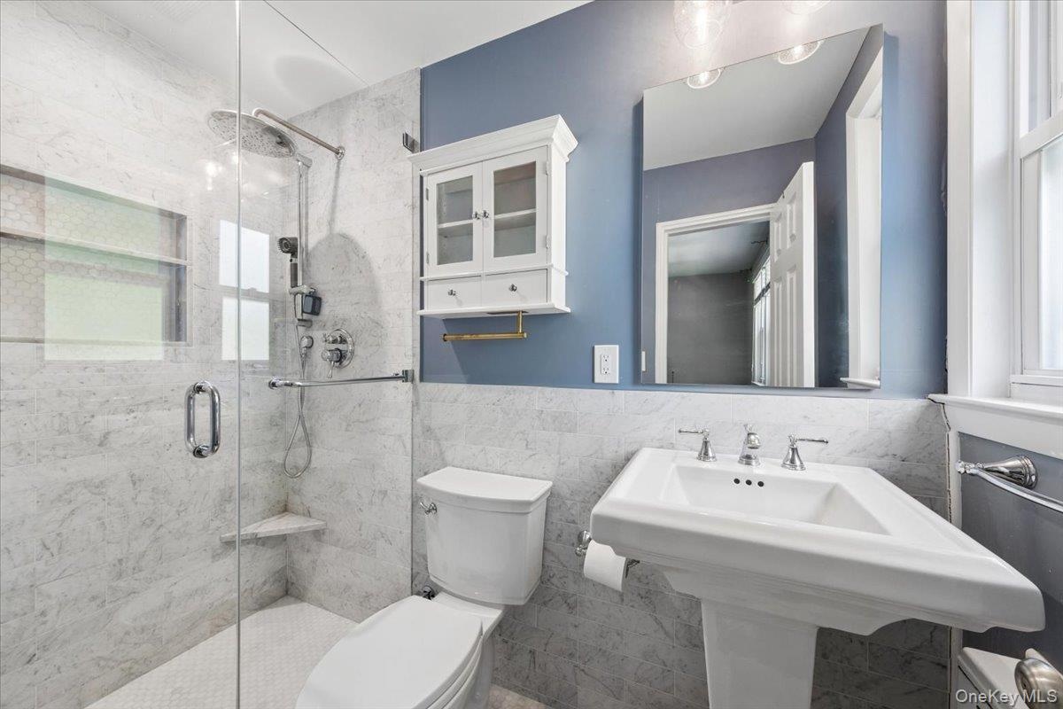 Renovated Primary Bathroom includes a Walk-in Shower