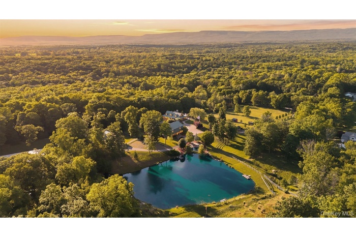 Welcome to one of the Hudson Valley's most iconic private estates—an extraordinary 38+ acre retreat offering luxury, recreation, equestrian amenities,