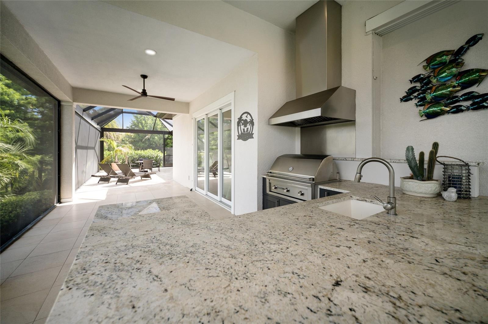 Outdoor kitchen with rear courtyard in the distance