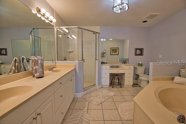 Master bath with separate shower-garden tub