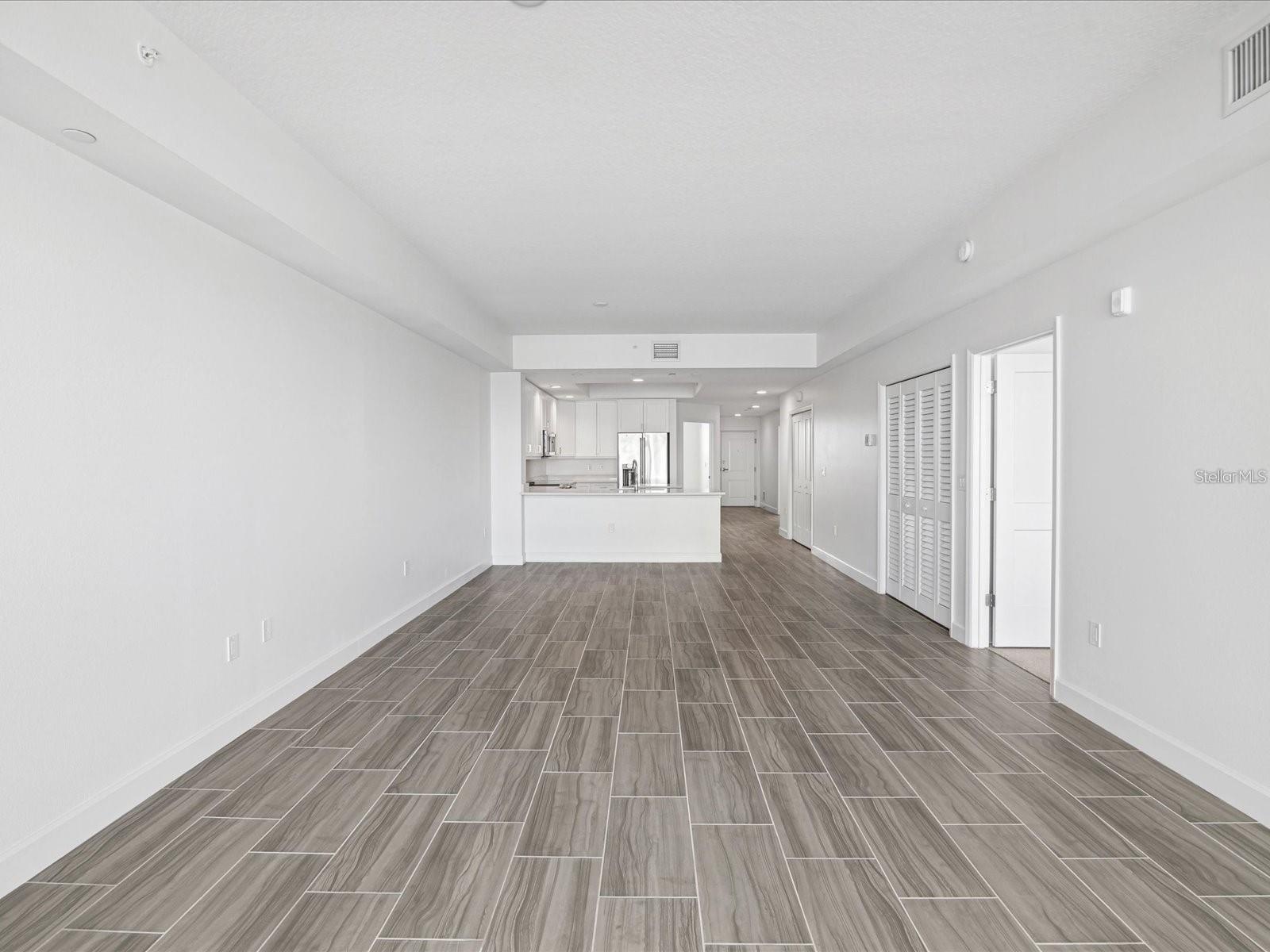 Family room looking to kitchen
