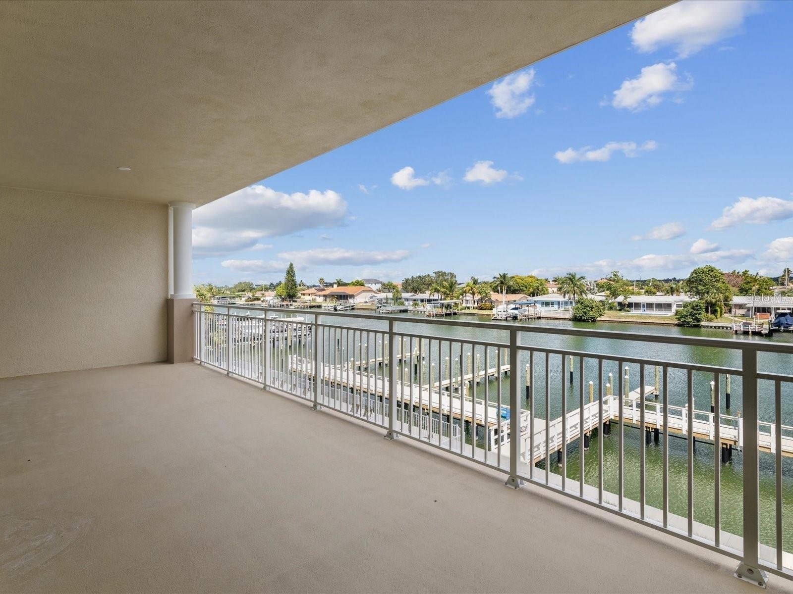 30' long balcony, with ceiling fan outlets, electricity and water spicket.