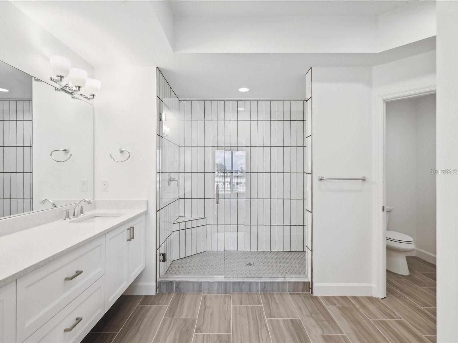 Primary bath has private water closet/