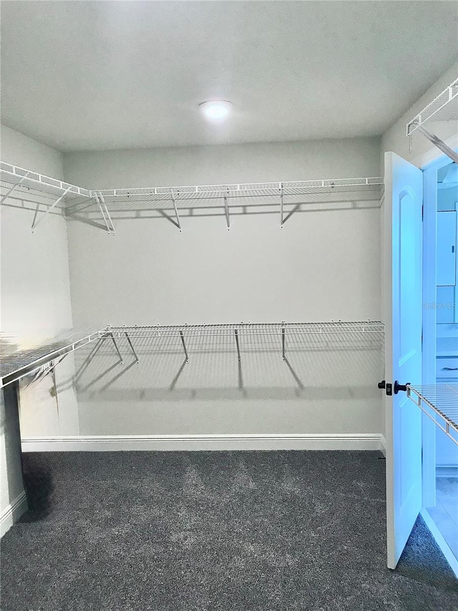 Master Bedroom closet facing out to the master bathroom
