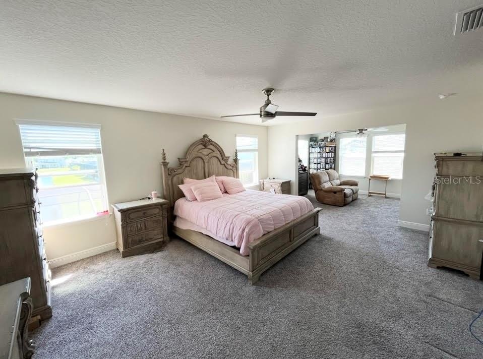Master Bedroom on 2nd Floor (furnished) revealing the expansion and retreat