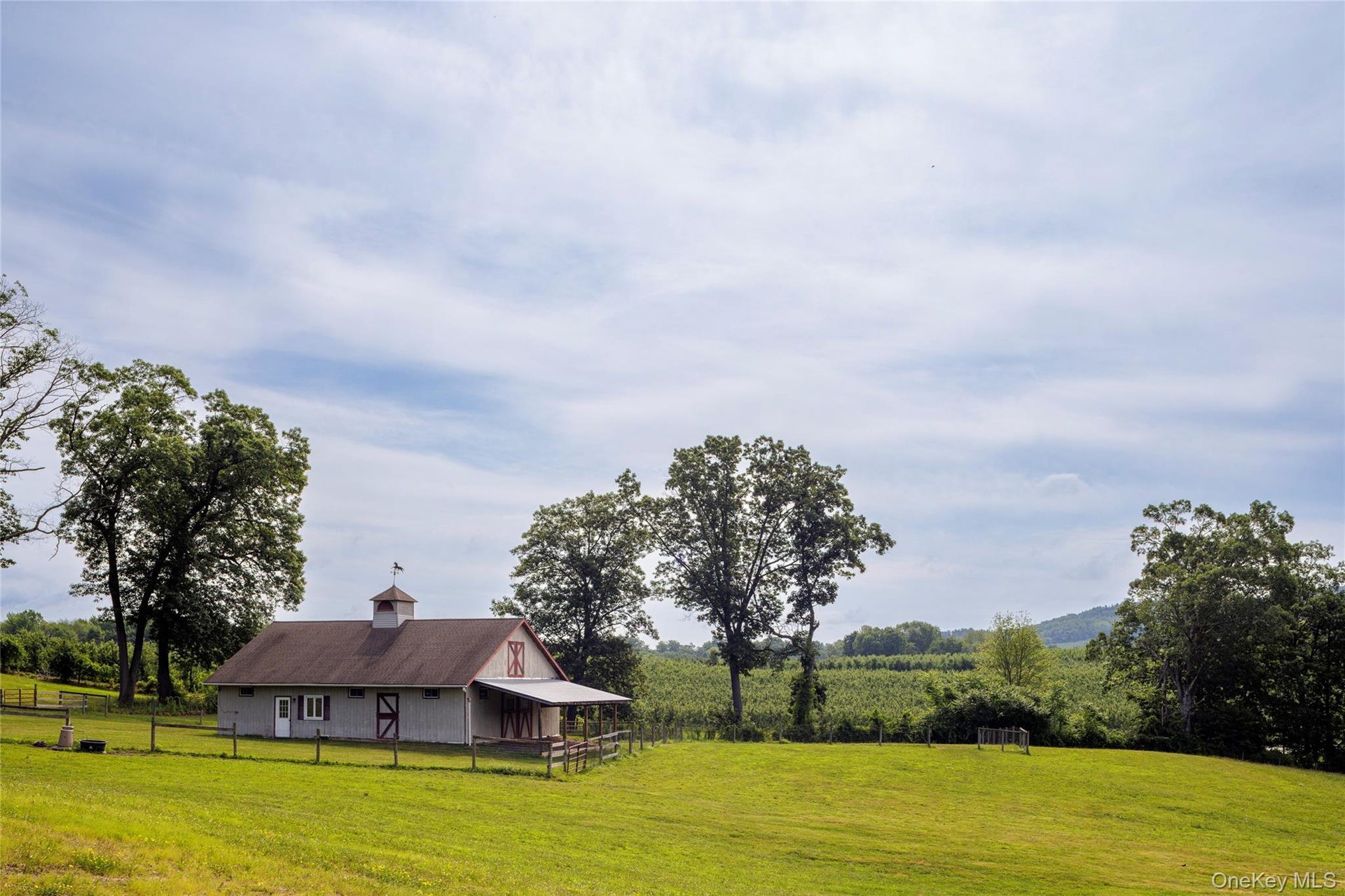 View of yard featuring a view of rural / pastoral area and an outdoor structure