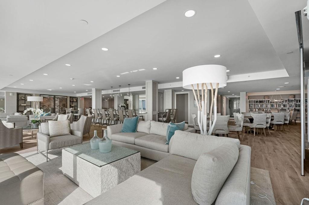 The Club Room offers a full kitchen, seating and dining areas, a library and game area.