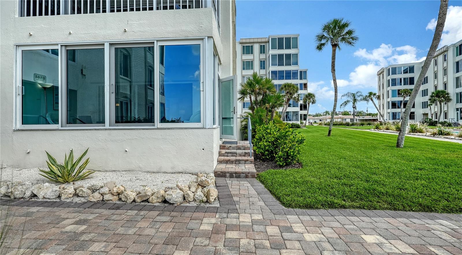 Raised floor level and easy steps to the front door = no storm damage.