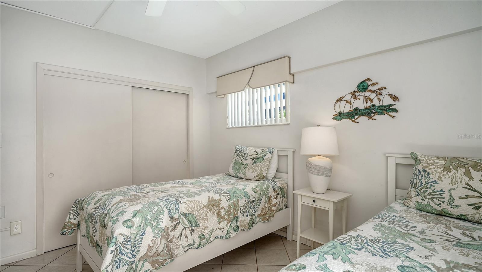 Two twin beds and good closet space.