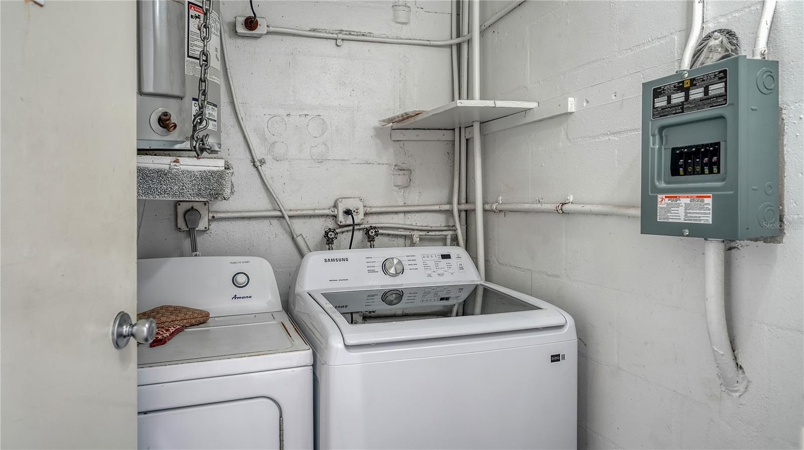 The laundry room is outside the door by the ramp