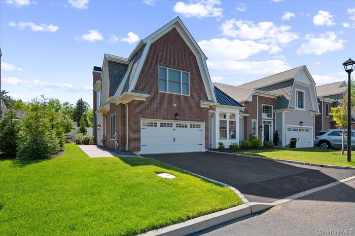 End Unit, Townhome Style with 2 floors and a basement.