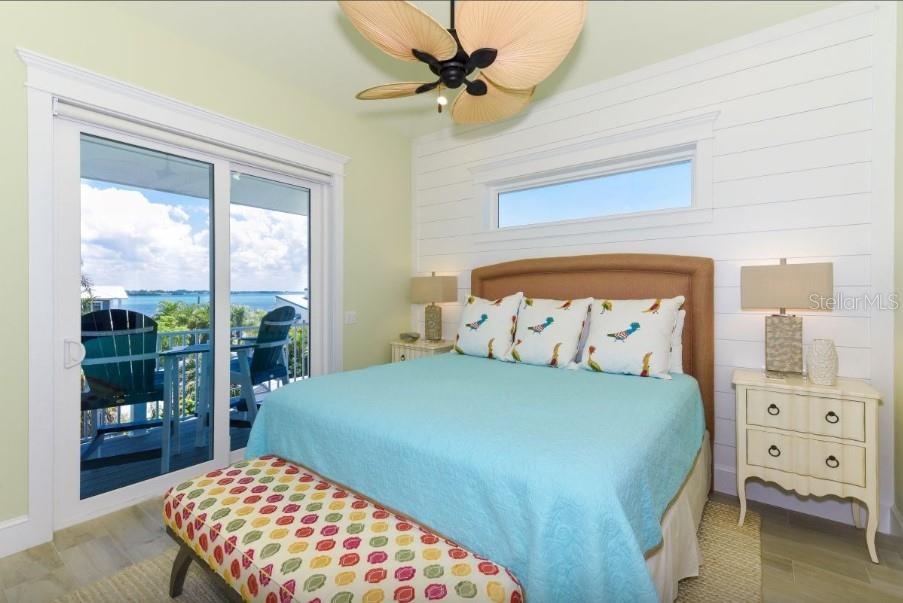 Bedroom #2 top level king bed with en suite bathroom and private balcony