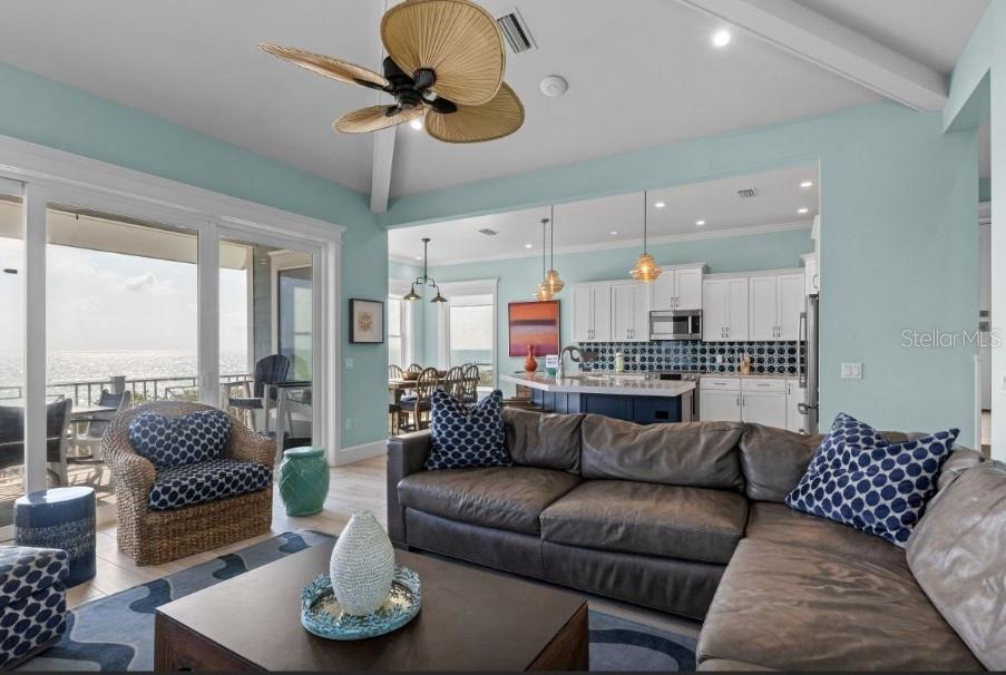 Top floor primary living area with beach views