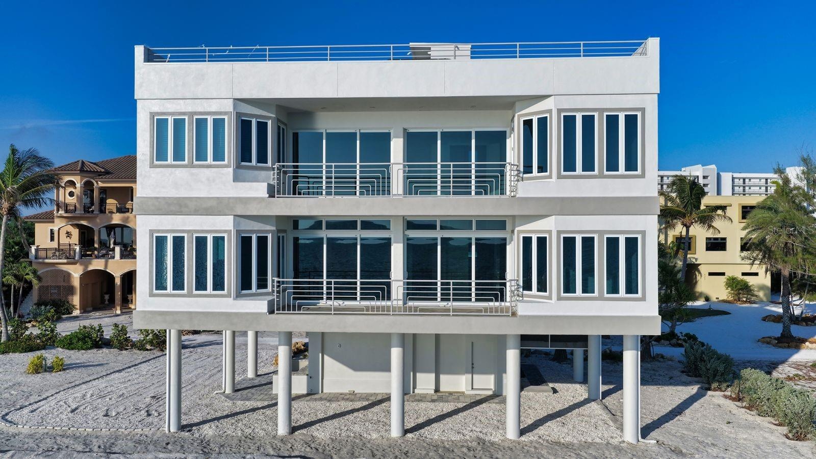 Impact Glass Windows and Doors throughout