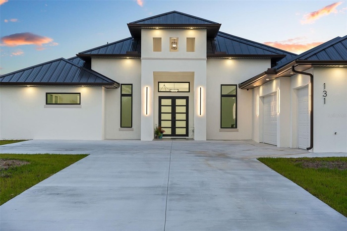 Covered front entry creating a warm and inviting first impression