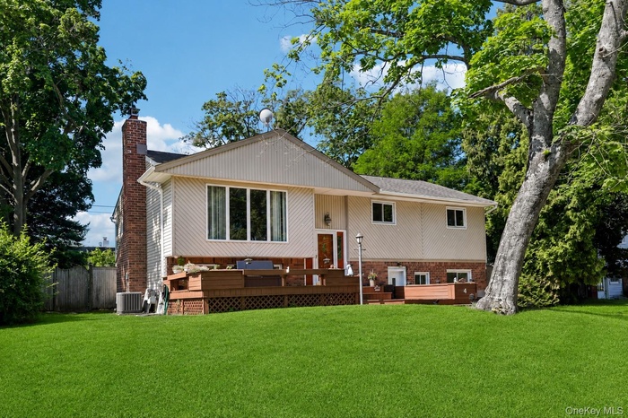 Sherbrooke Manor home with brick & siding front, newly finished open porch