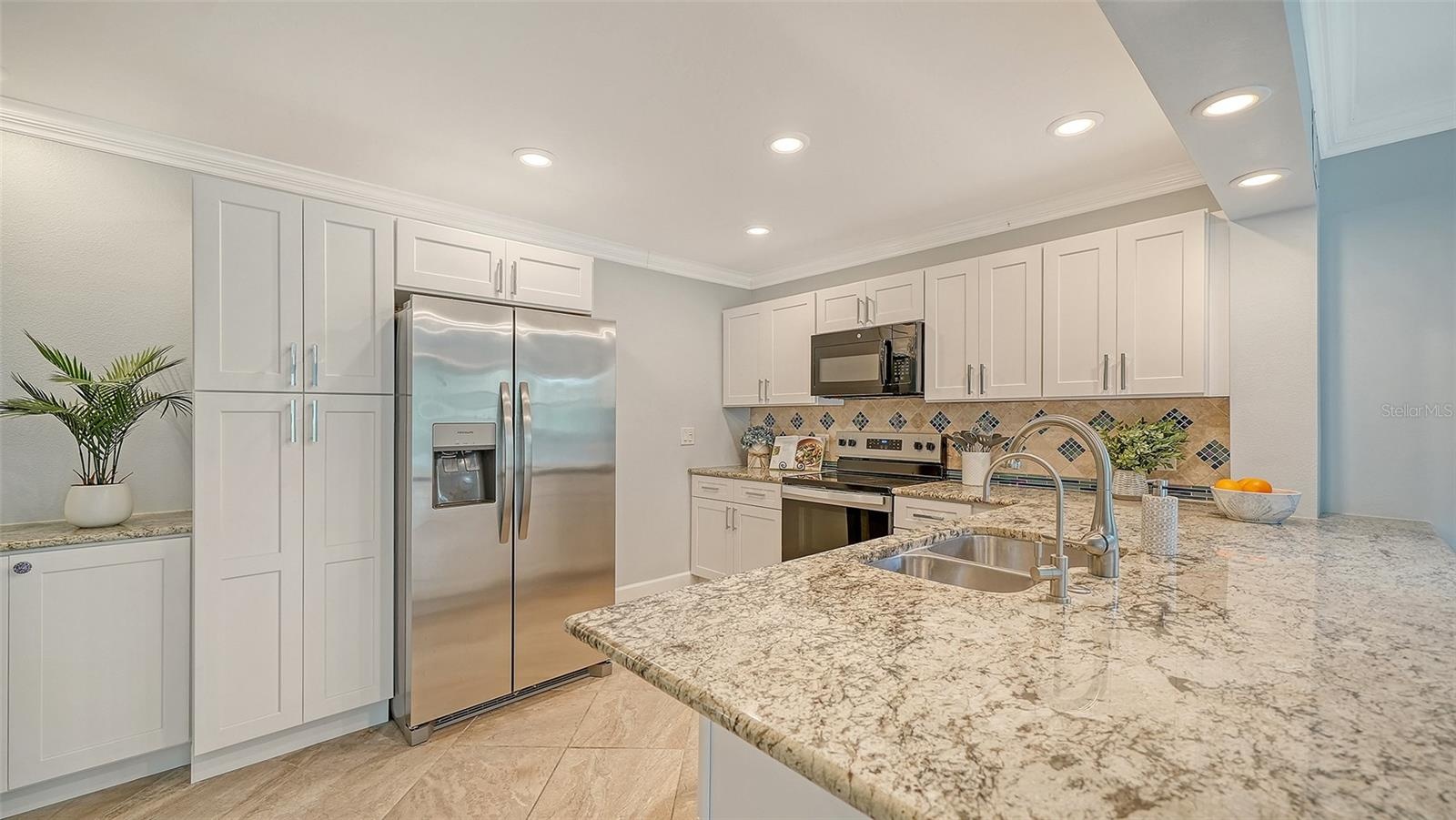 Overhead recessed, dimmable lighting.