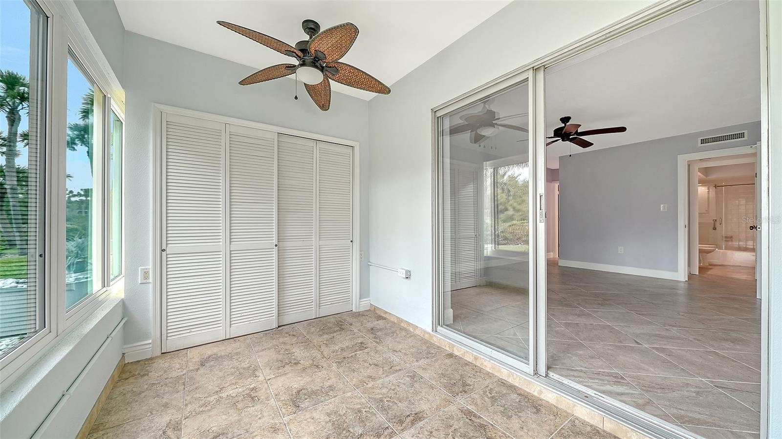 The lanai contains a rare built-in storage closet outside of the primary bedroom.