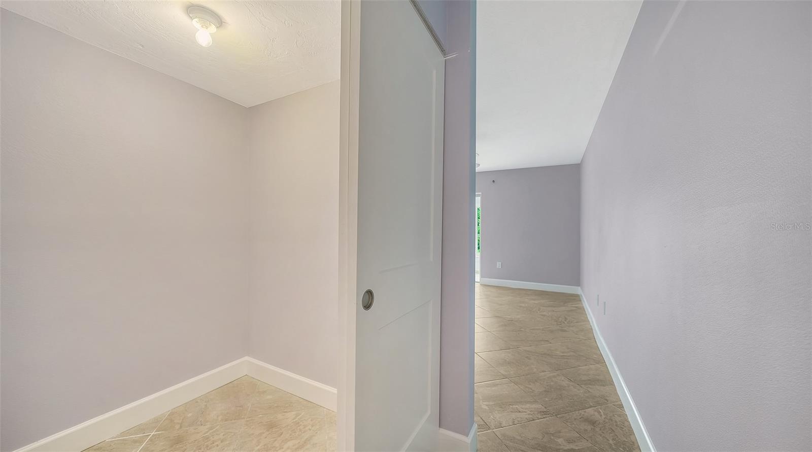 Primary walk-in closet.