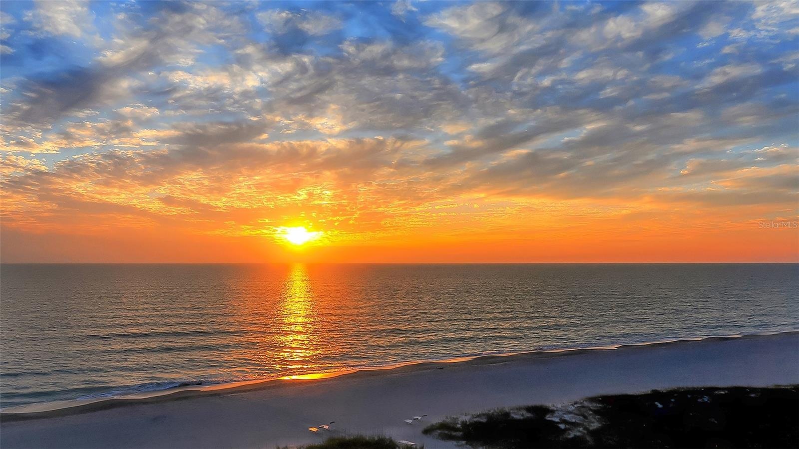 Sunset at the Whispering Sands beach.
