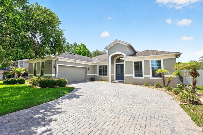 Welcome to this IMPECCABLY MAINTAINED 4-bedroom, 3-bath POOL HOME in the DESIRABLE GATED COMMUNITY of Wekiva Run, where elegant design, thoughtful upg