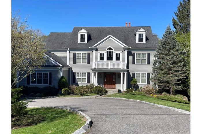 Welcome to 77 Byram Ridge Rd, Armonk, just minutes from the town pool and town center. This 6000 sq ft center hall colonial on an acre plus of flat, l