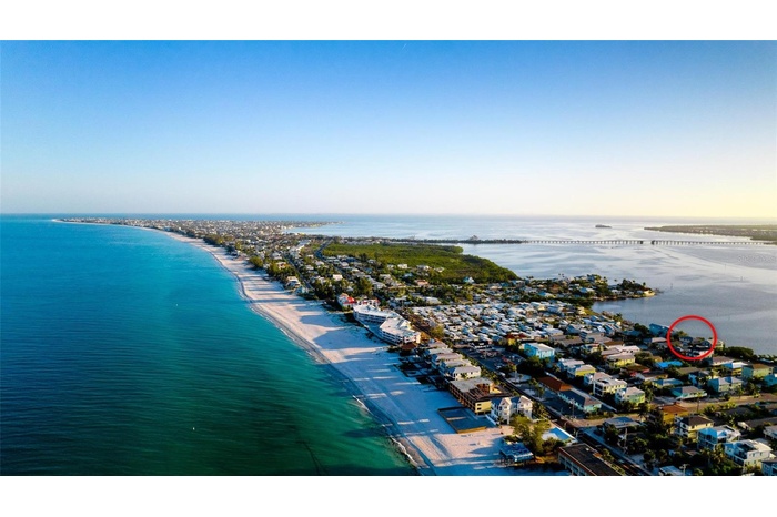 Nearly 100 feet of direct Sarasota Bay frontage with panoramic open-water views.