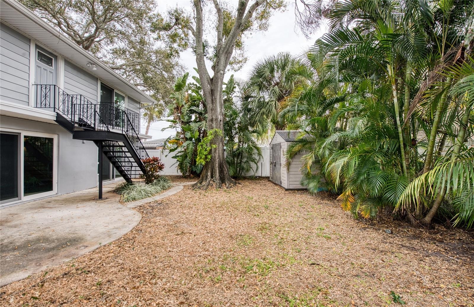 Private Rear Yard with access to Pool Area and Second Floor exterior door