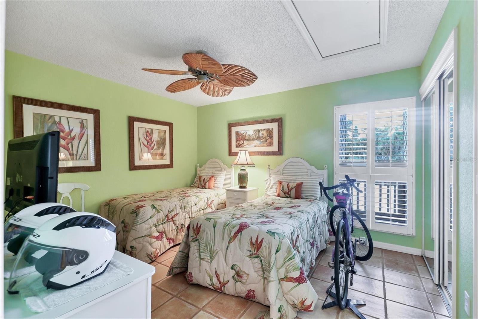 Front Guest Room w/ Plantation Shutters & Attic Access for Extra Storage