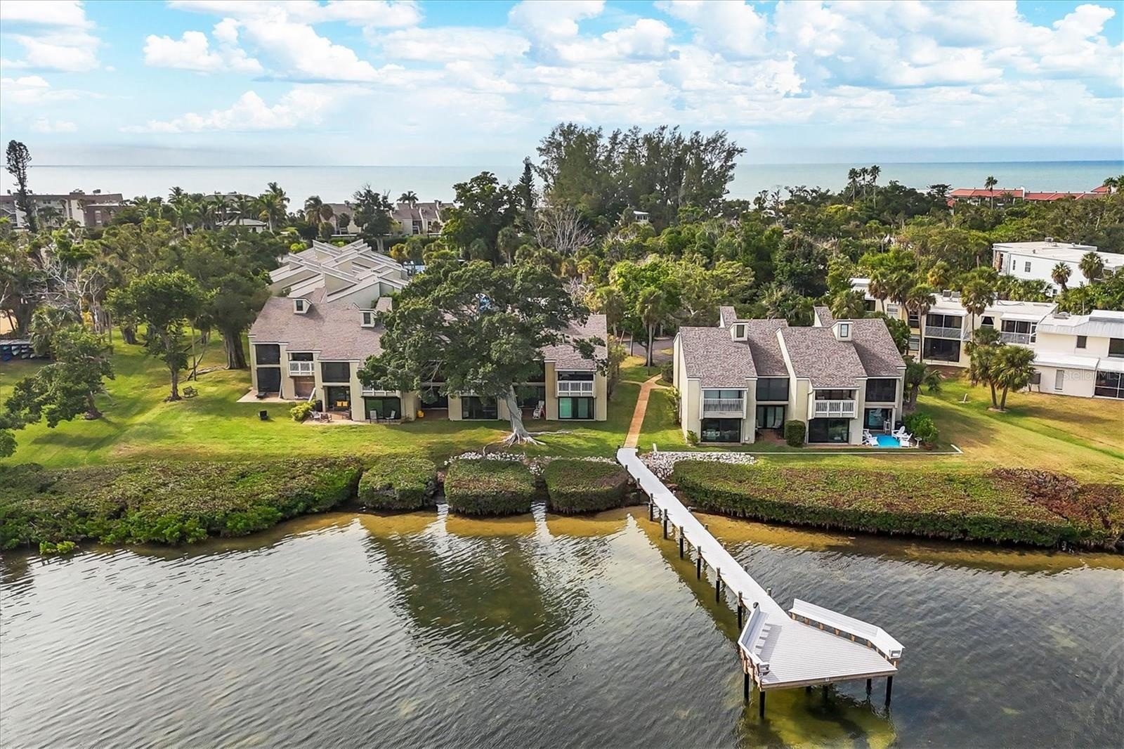 Rear of condo with Day Dock / Fishing Pier