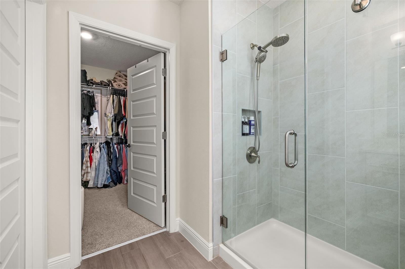 Framless shower Master Suite with huge walk in closet