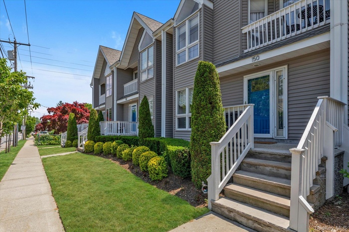Front with Private Porch.
