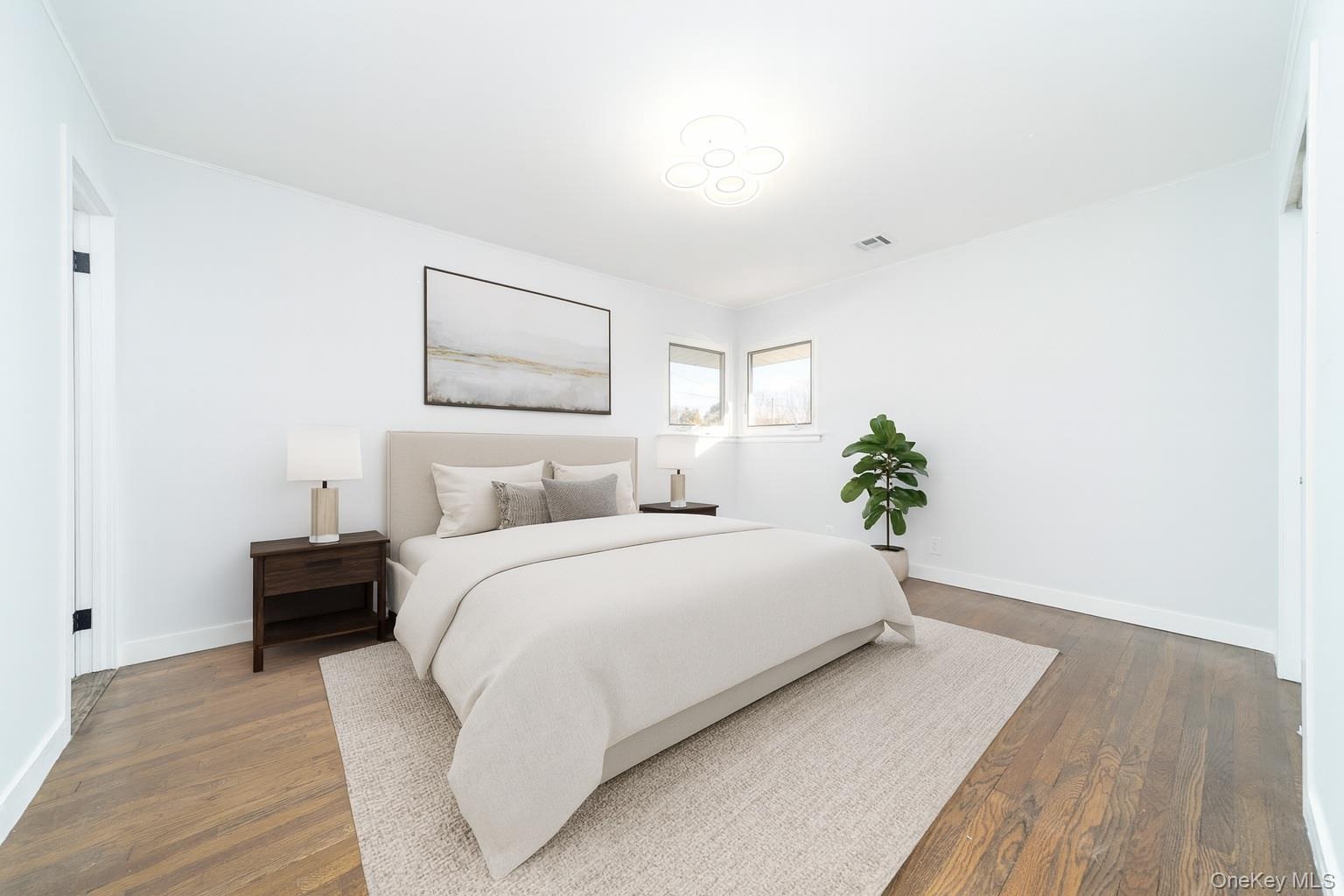 Bedroom featuring dark wood finished floors