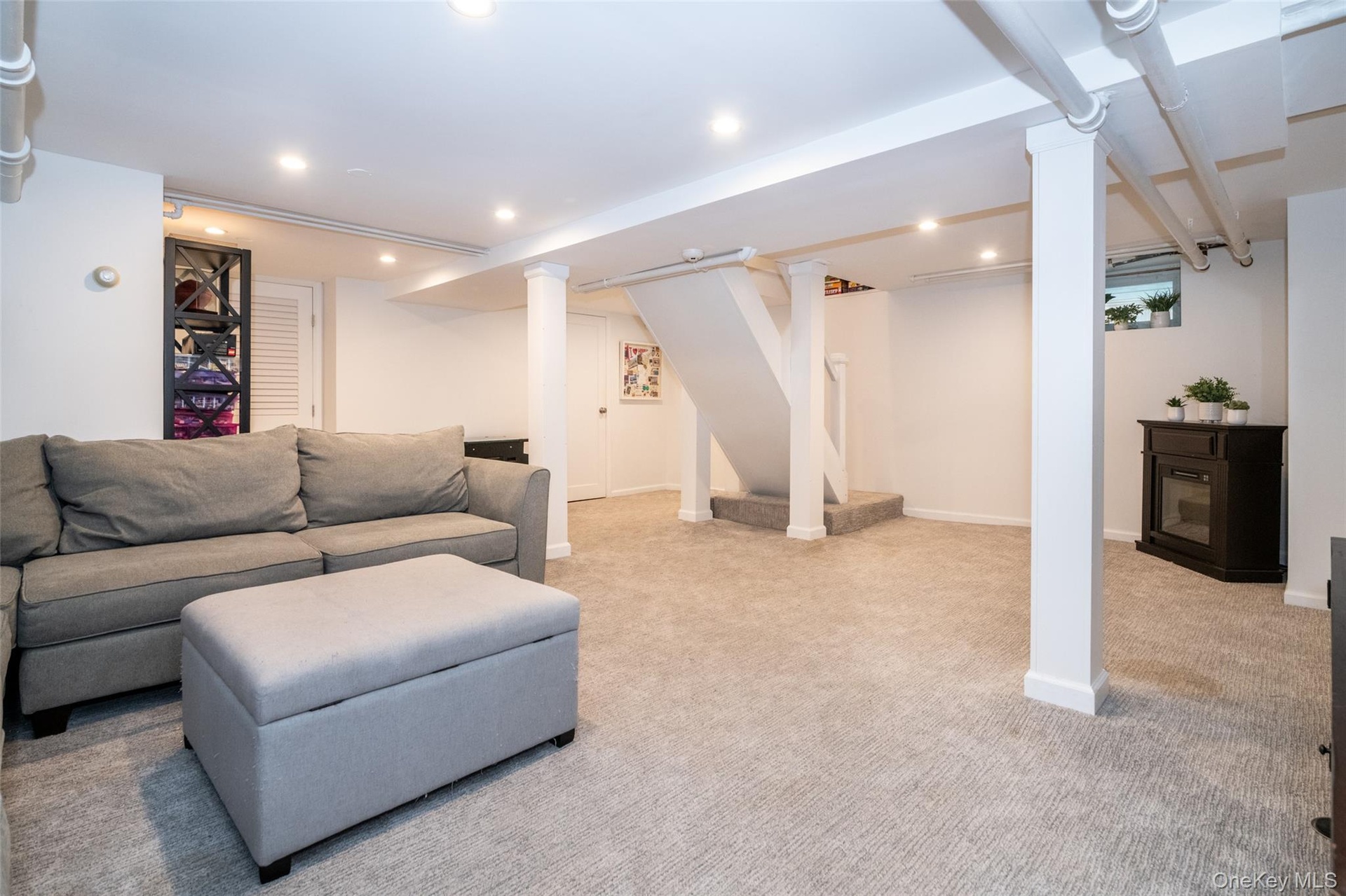 Lower Level has recreation space, laundry, plentiful storage and utilities