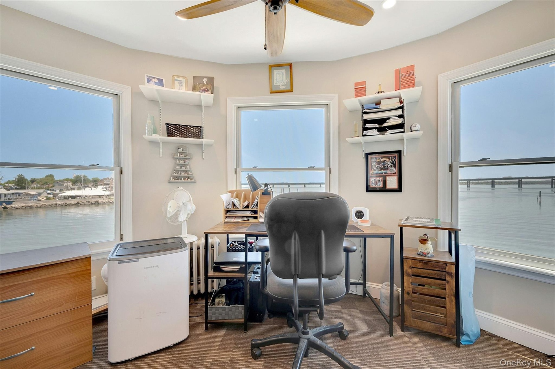 Office with hurricane windows with views of Long Island Sound