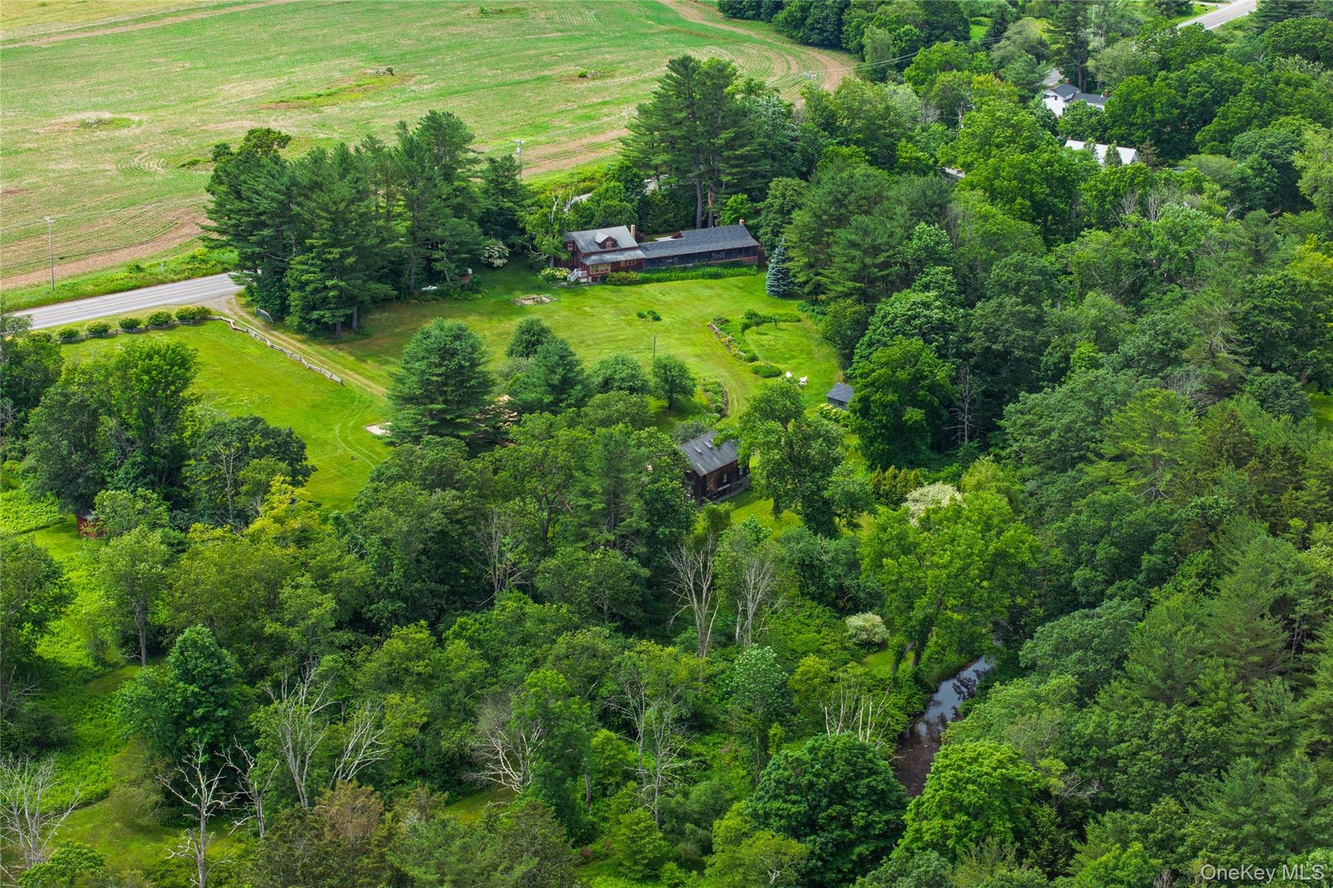Aerial overview of property's location featuring rural landscape and a pastoral area