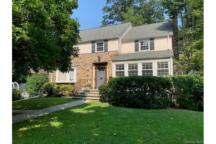 Front of house featuring beautifully decorative fieldstone.