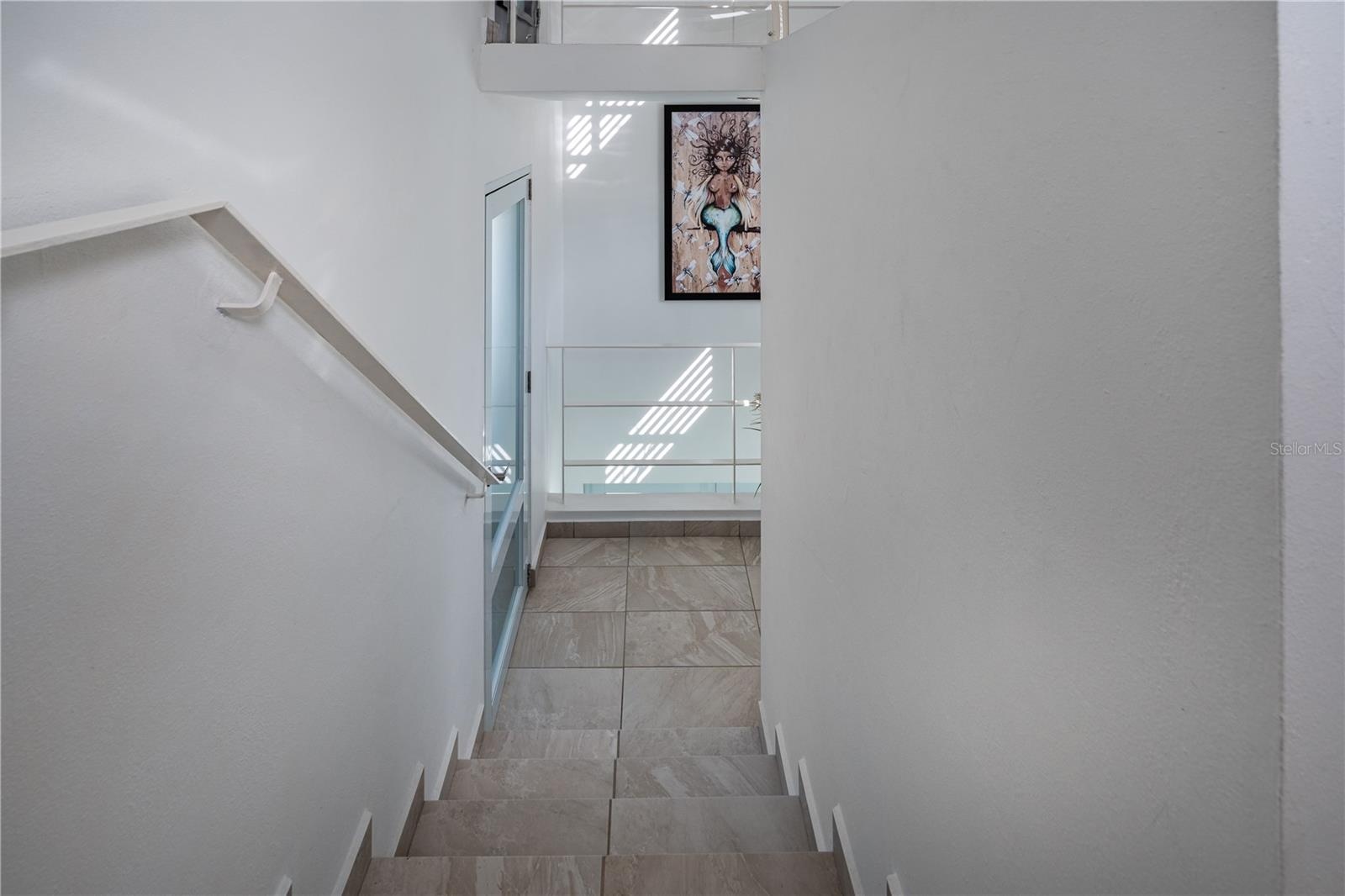 Stairs to third level unit
