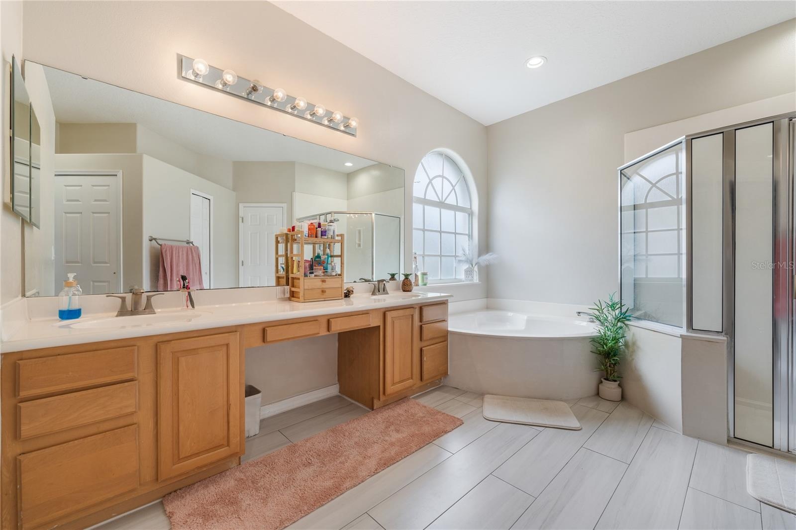 Primary bath with dual sinks and practical layout designed for everyday convenience.