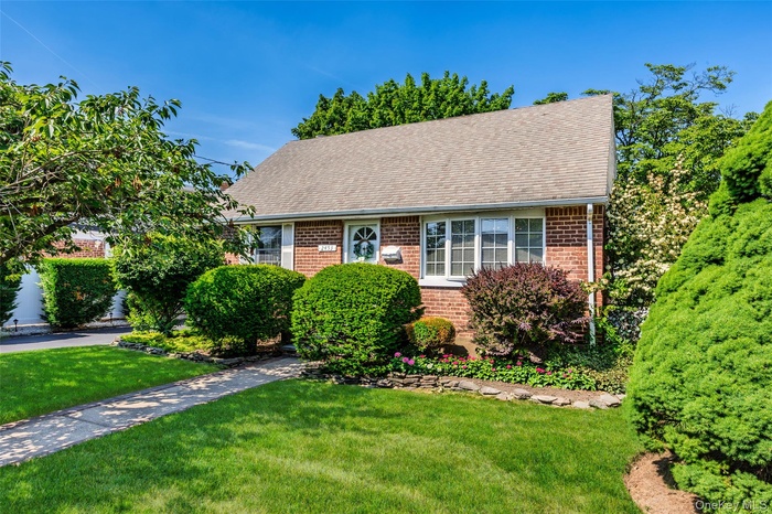 NEAT AS A PIN!4 Bedroom, 2 Bath Cape home w/full rear dormer.