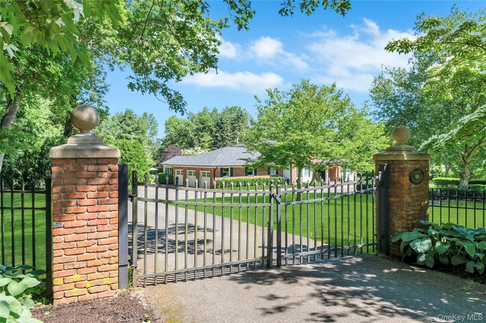 Private entry with an iron cast front gate