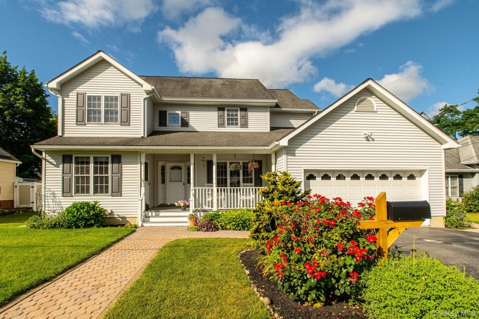 Welcome to 18 Barrett Place, an updated 4-bedroom home in the heart of Beacon.
