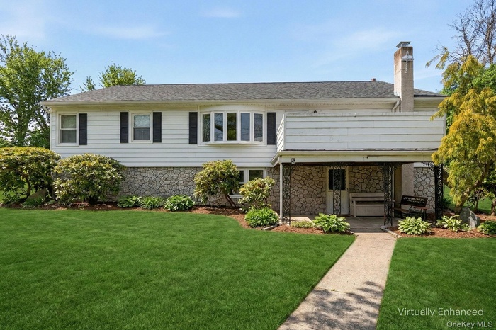 Beautiful ranch with a finished lower level and separate entrances on each level.
