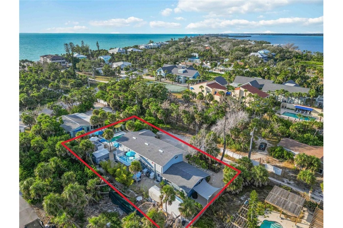 Over 1/2 acre on a private road on Manasota Key