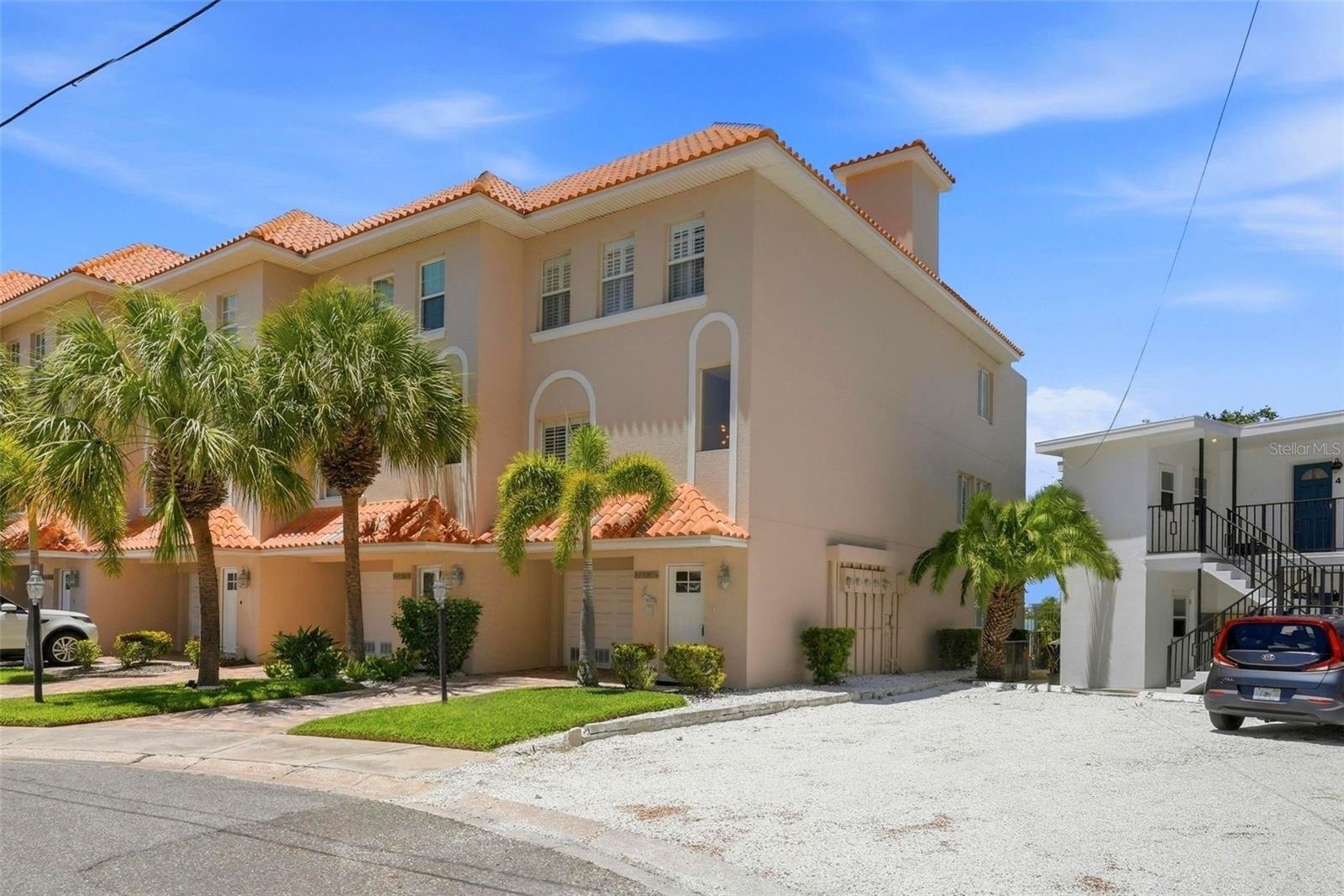 Welcome to this exceptional waterfront corner-unit townhome, offering 3B/3B - three levels with sweeping water views from every floor.  It features an