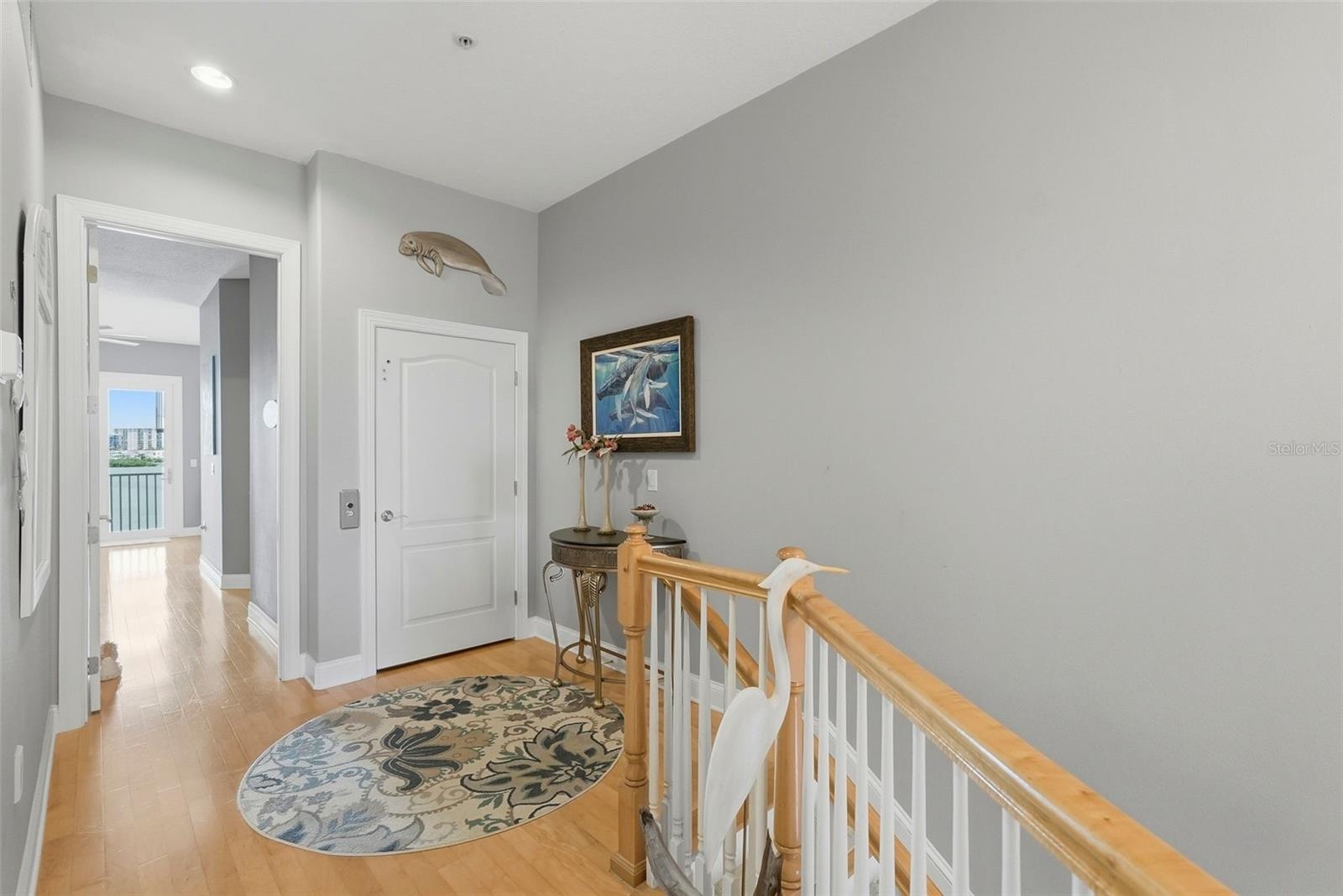 Stairway up to the third level (don't forget, you can also take the private elevator!) which includes the master, guest bedroom on opposite end and th